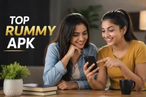 Two Gen Z women reviewing Top Rummy APK information on a smartphone in a modern indoor setting.